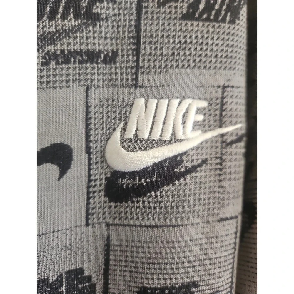 Child's Nike Hooded Sweatshirt Size Large With Overall Logo Print