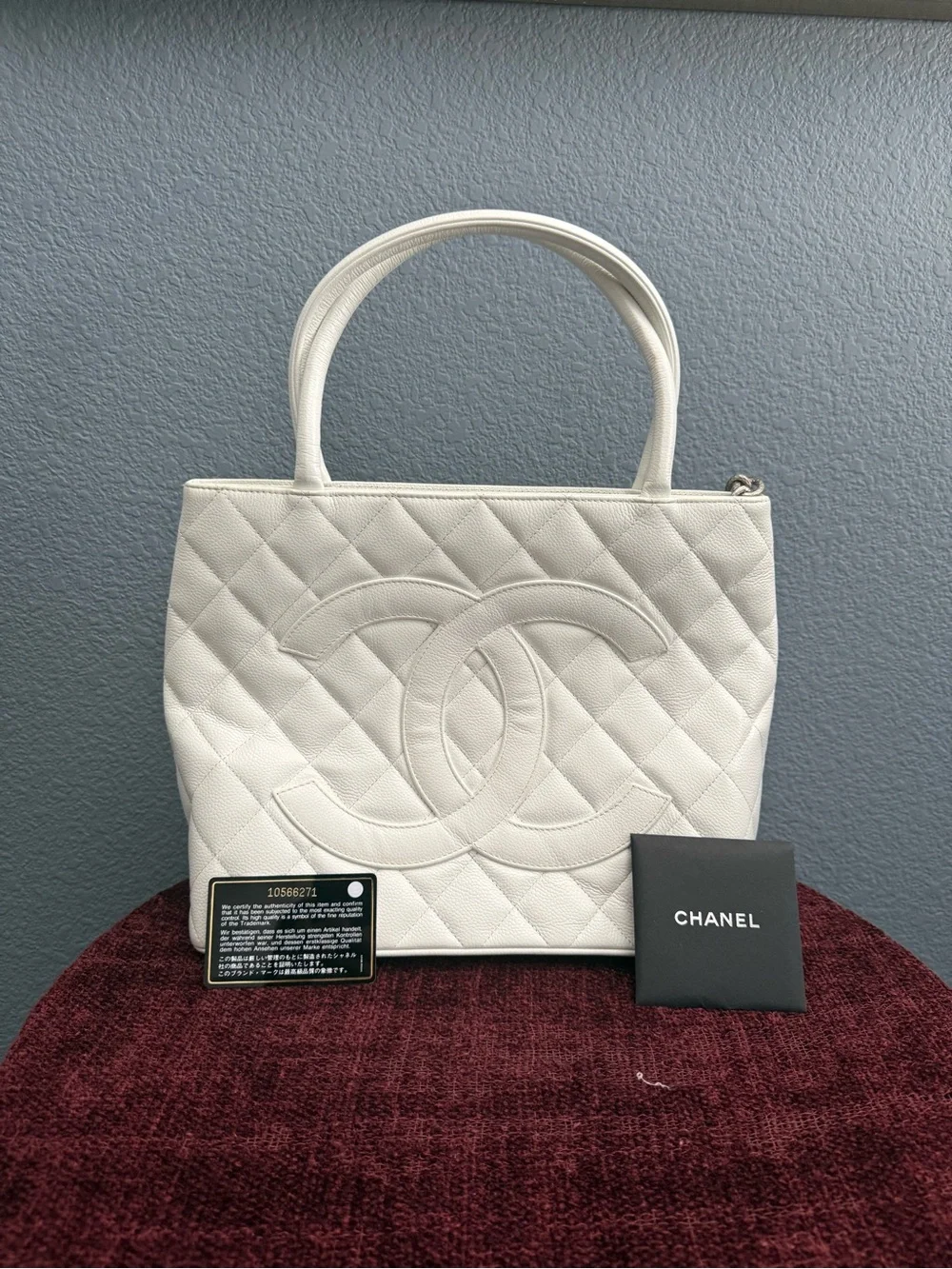 CHANEL Caviar Quilted Leather Tote with Silver Medallion