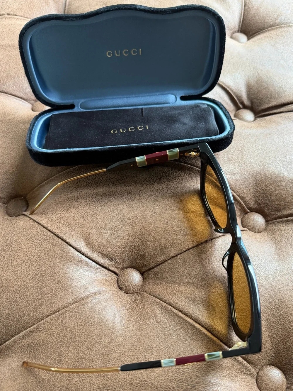Gucci Black Frame Sunglasses with Amber Lenses