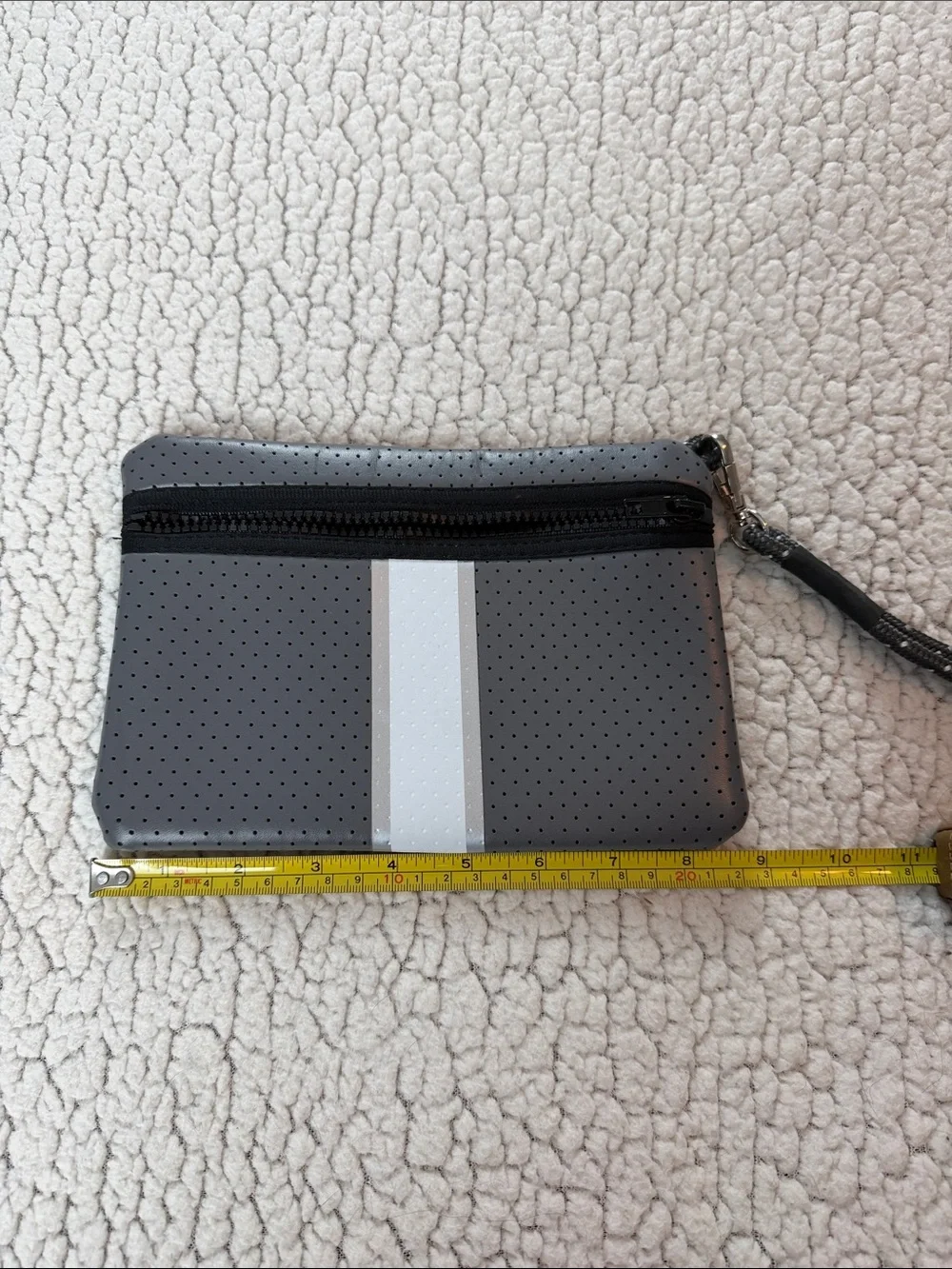 Perforated Gray Wristlet with Stripe Accent