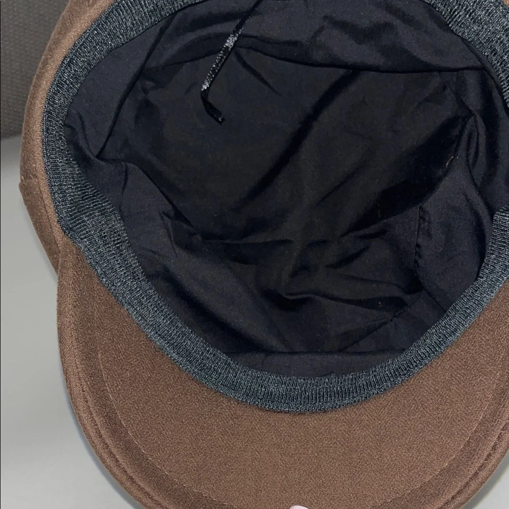 Source Unknown stylish brown