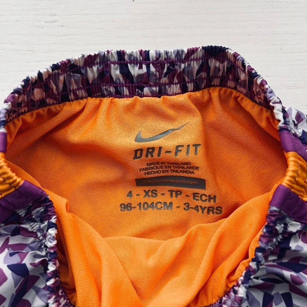 Nike Dri fit girls running shorts size 4 purple/orange