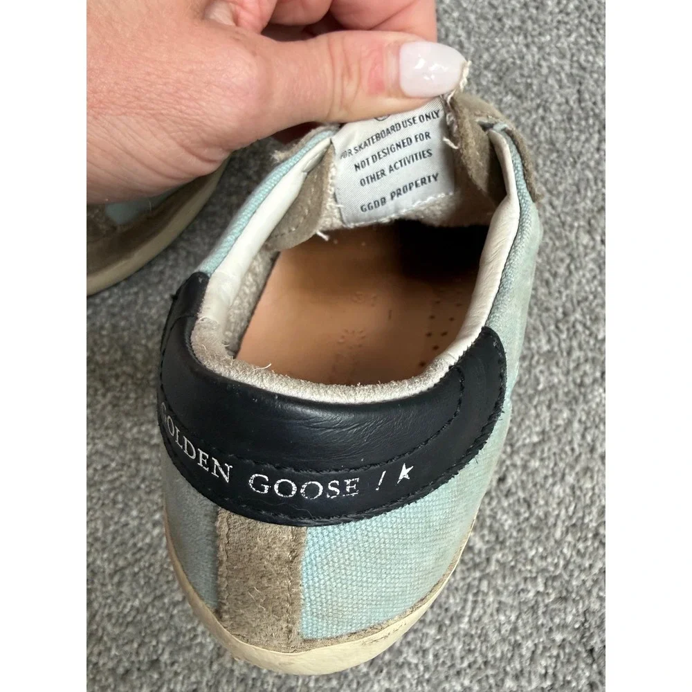 Golden Goose branding perforated