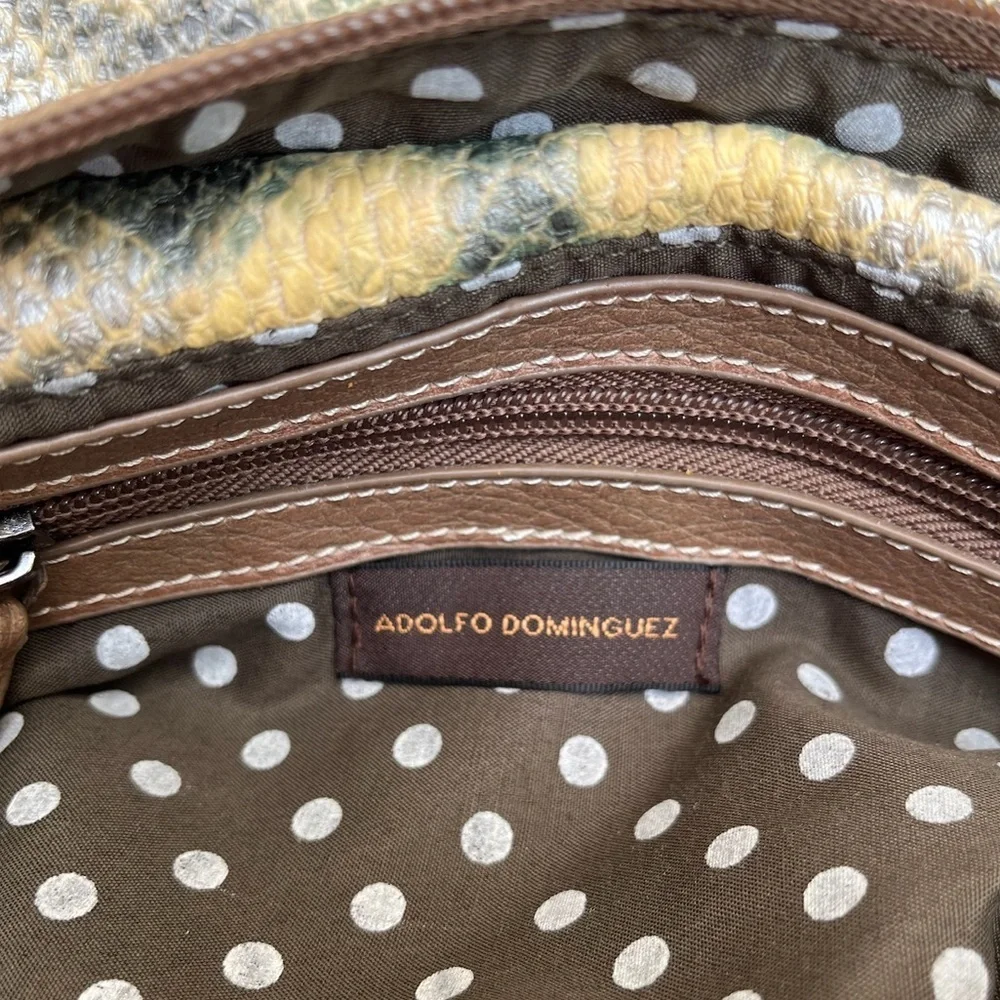 Adolfo Dominguez compact closure exterior
