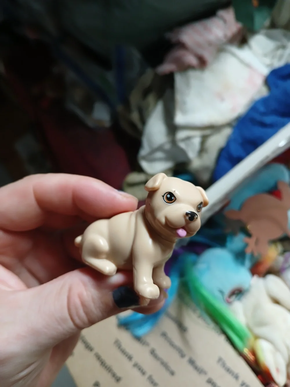 Mattel Barbie pet dog (specifically a bulldog/pug puppy),