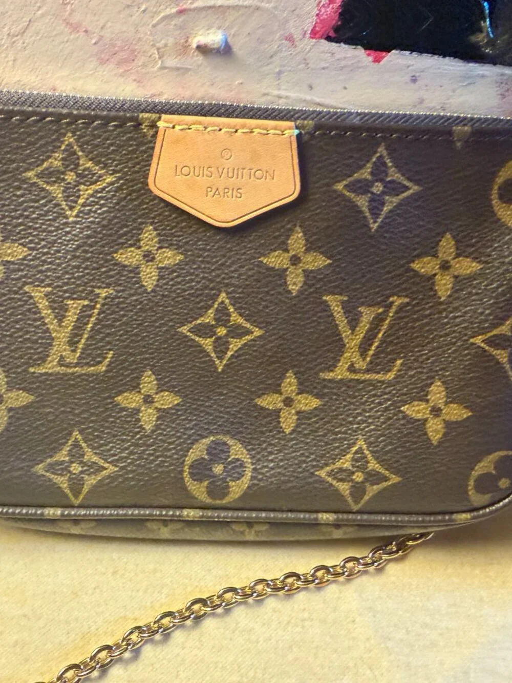 Louis Vuitton mini versatile pochette