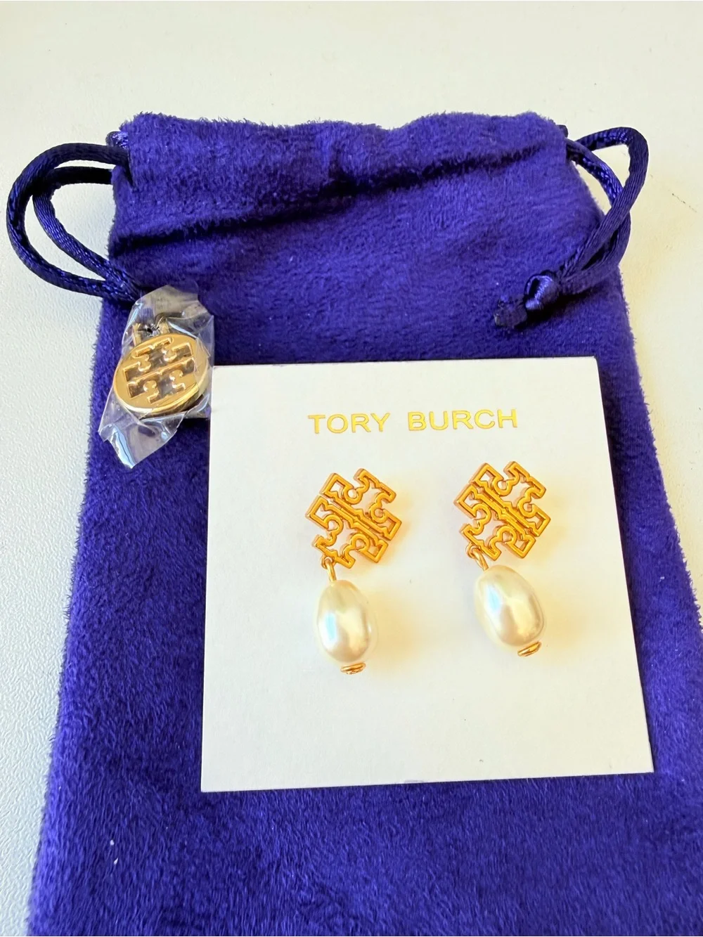 Tory Burch gold tone