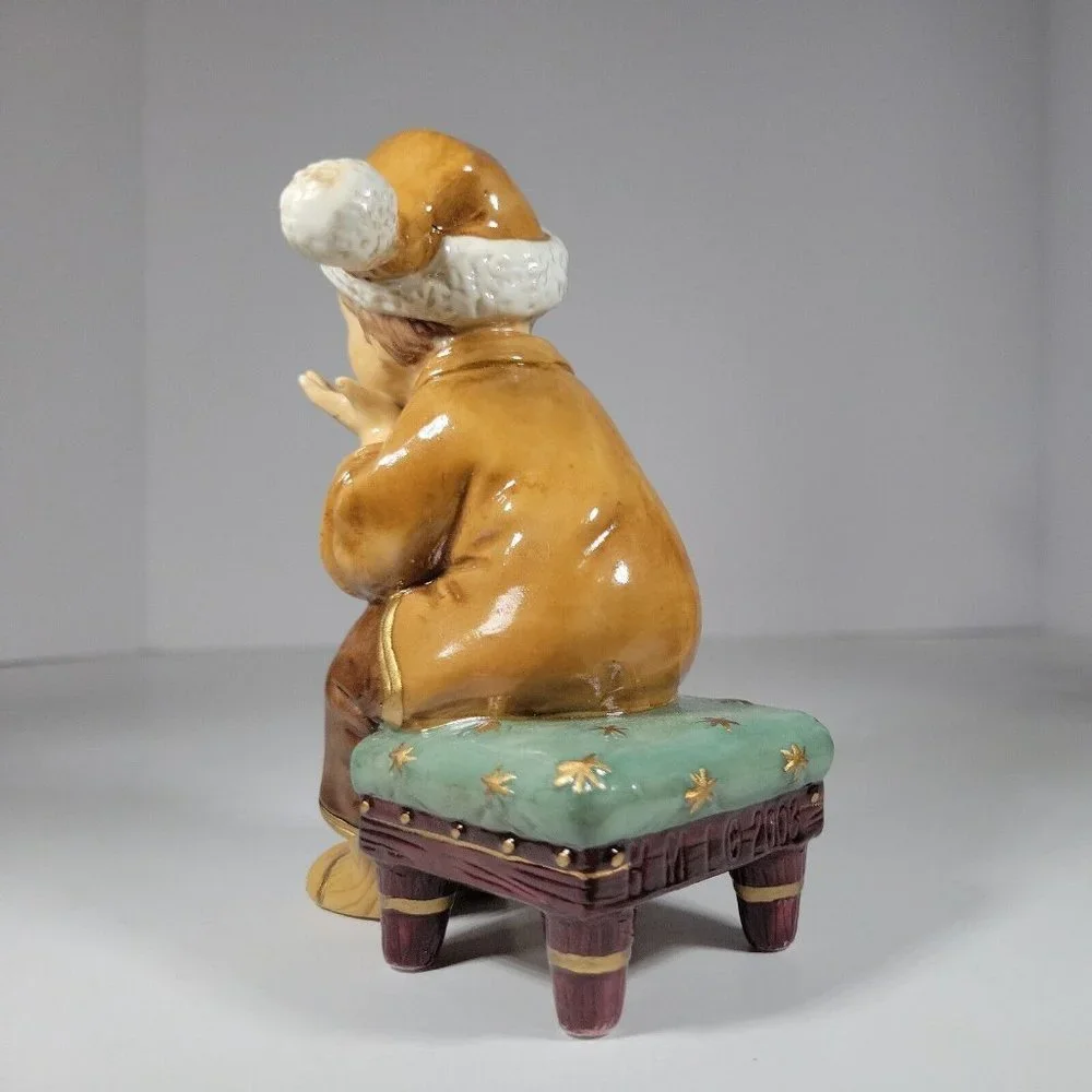 Heritage Mint Ltd. boy porcelain carefully