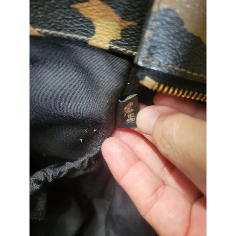 Coach item used