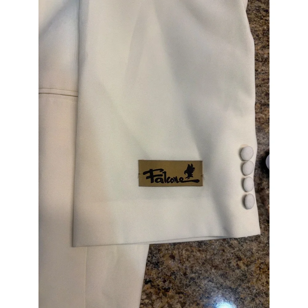 Falcone curtis vested