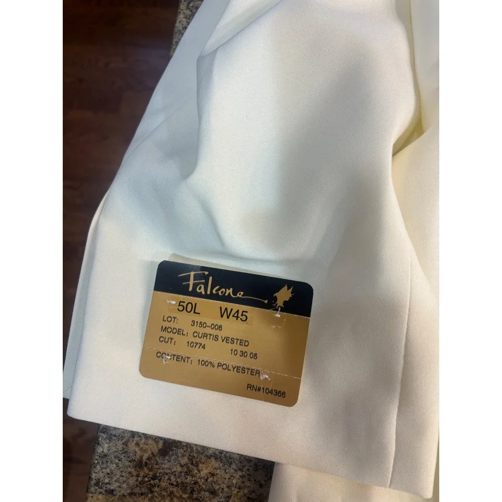Falcone curtis vested