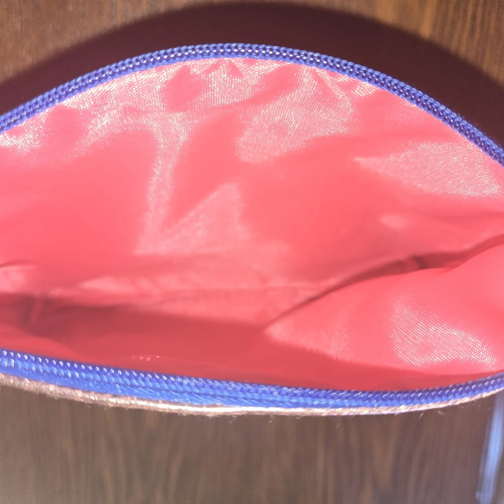 and off she went to save the world... Ipsy Metallic Rose Gold Makeup Bag