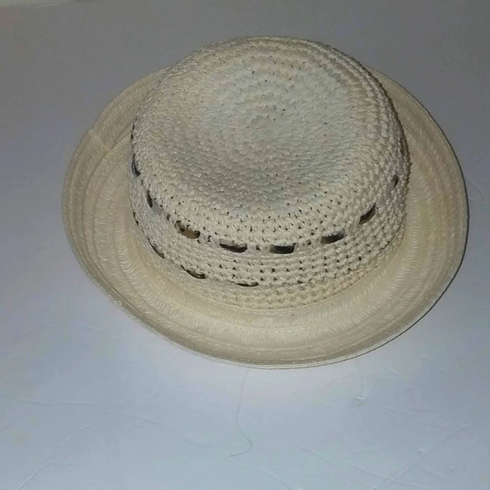 Hat. Wide rim. Straw.