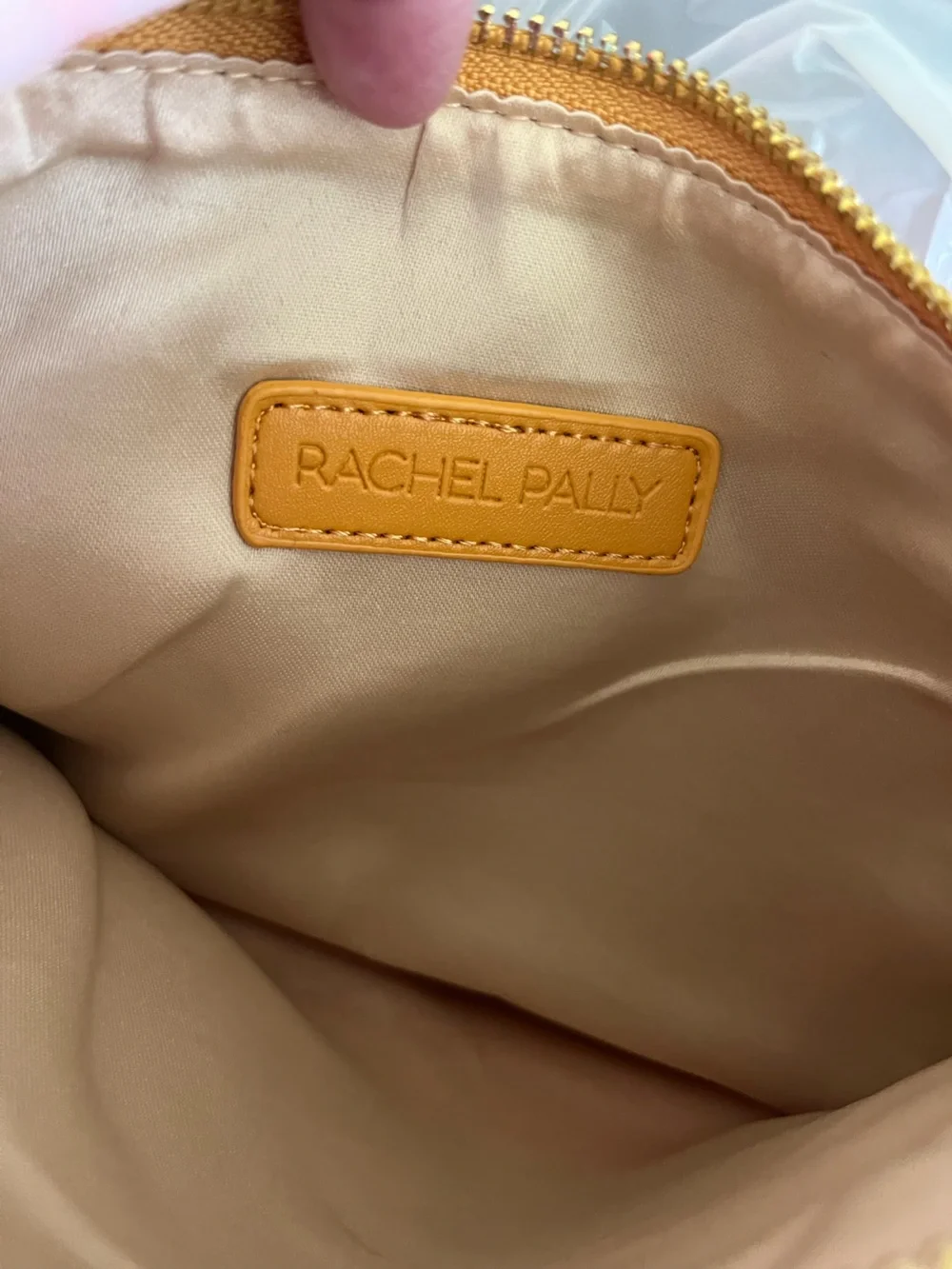 Rachel Pally clutches tassel spring