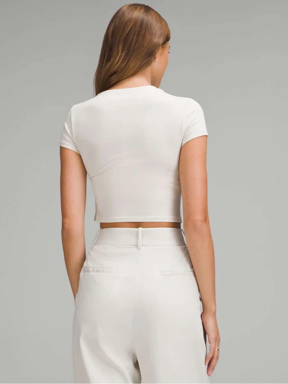 Lululemon asymmetric front-twist top in cream/bone color  Size M