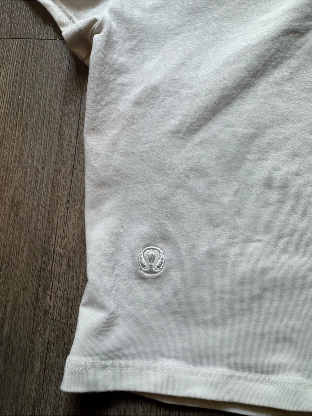 Lululemon asymmetric front-twist top in cream/bone color  Size M