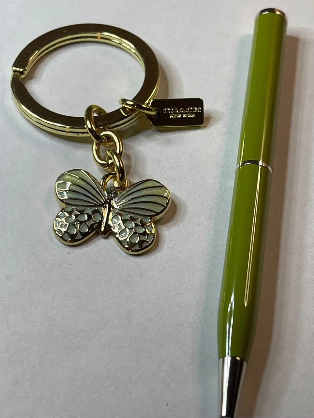 Coach Gold Butterfly Key Ring with Green Enamel Charm and Coach Pen