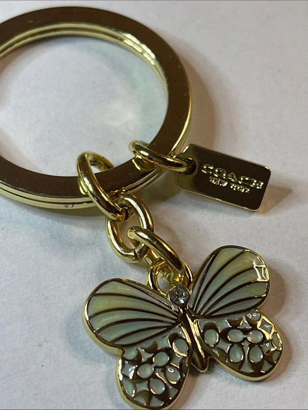 Coach Gold Butterfly Key Ring with Green Enamel Charm and Coach Pen