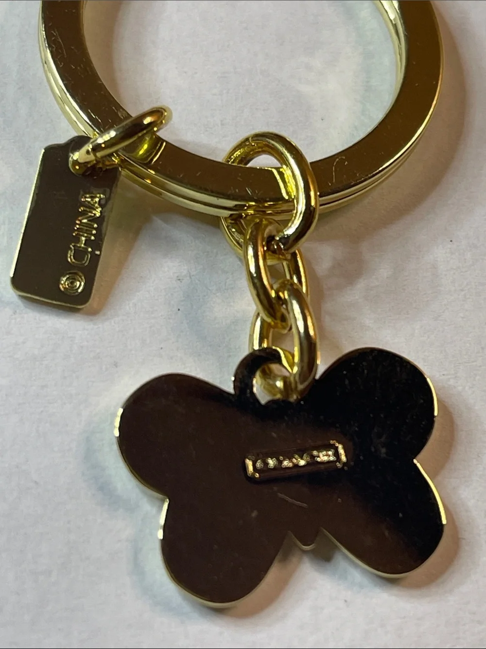 Coach Gold Butterfly Key Ring with Green Enamel Charm and Coach Pen