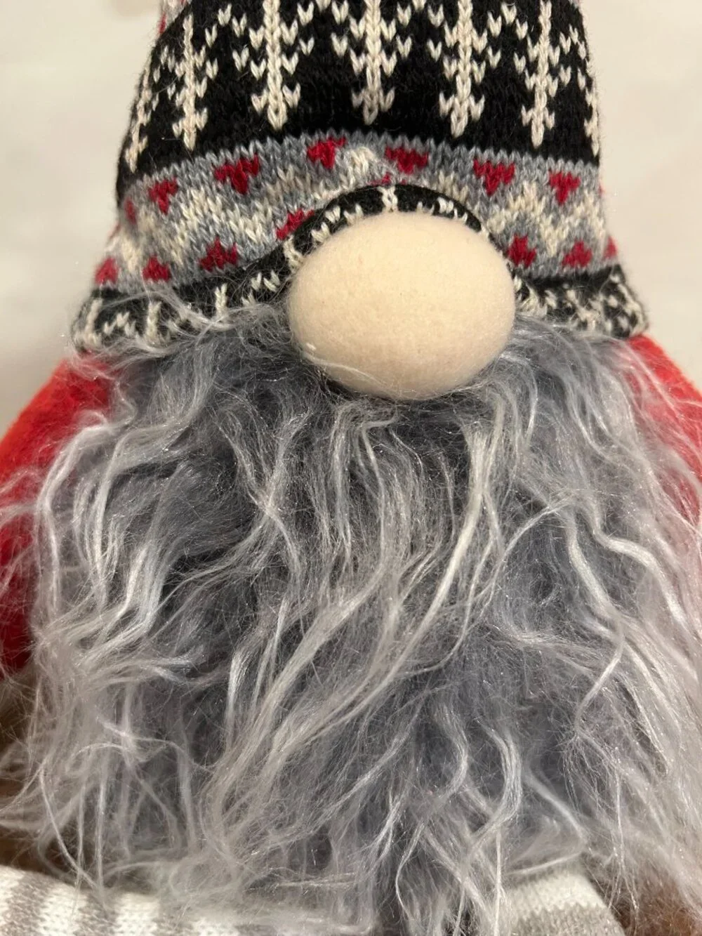 Christmas Holiday Gnome with knit cap, striped stockings and wispy gray beard