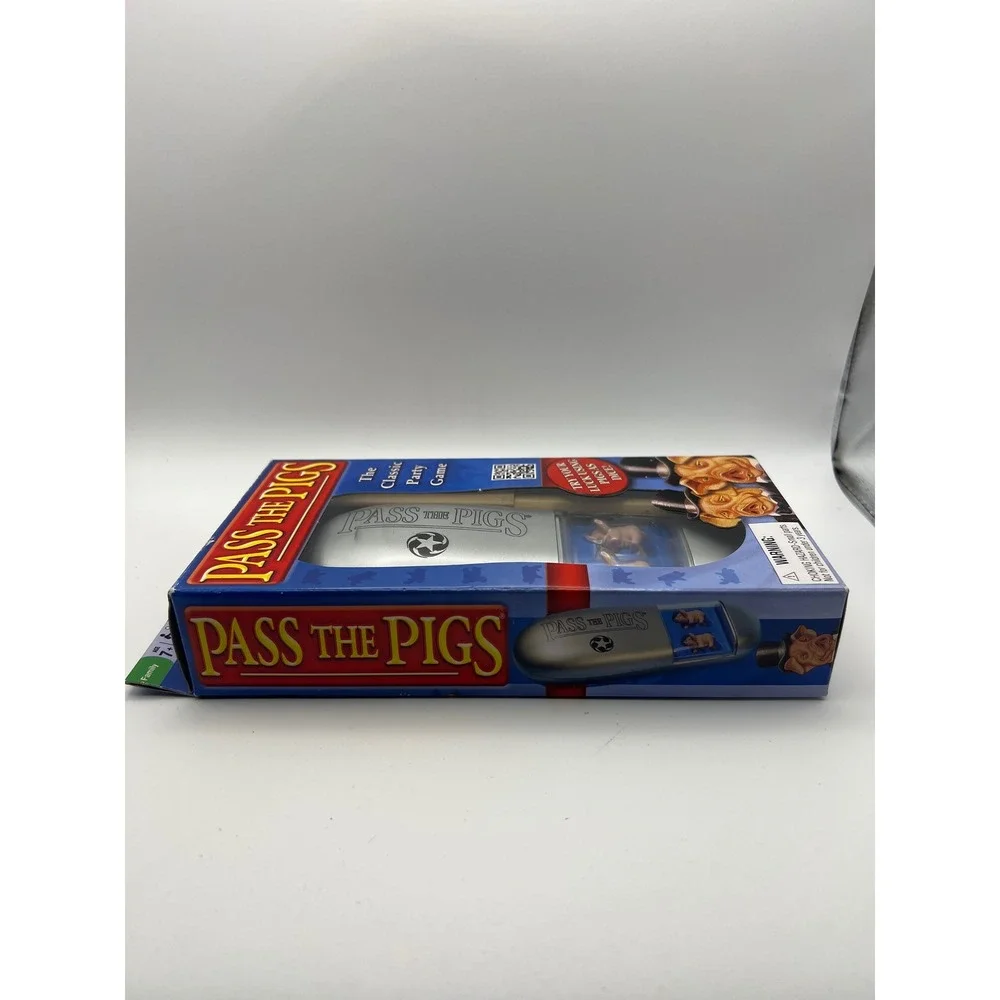 Winning Moves Games pass pigs