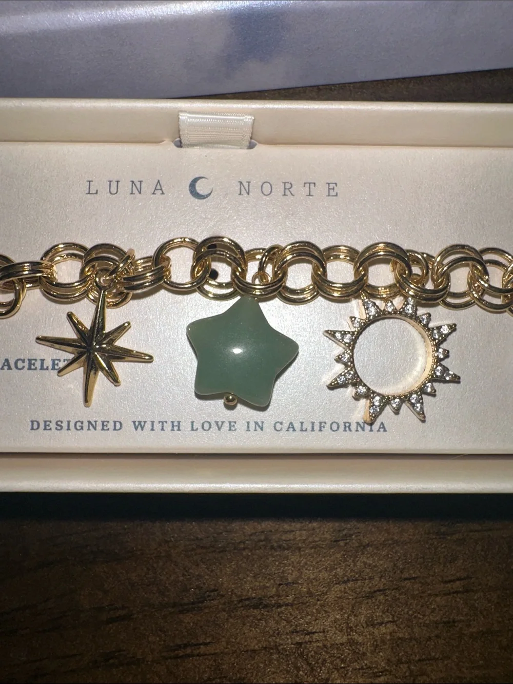 Luna Norte finish charm elegant