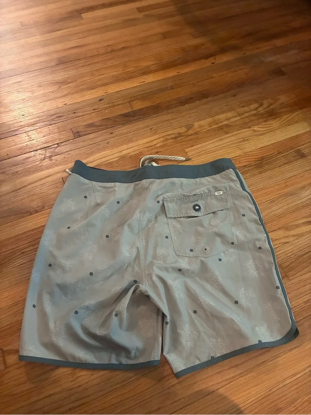 Vuori Light Gray Swim Shorts with Navy Trim