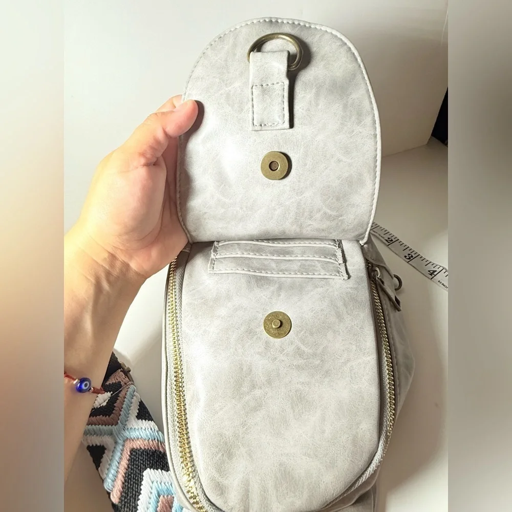 Source Unknown stylish crossbody