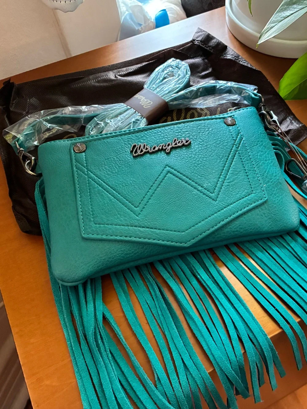 Wrangler teal wristlet