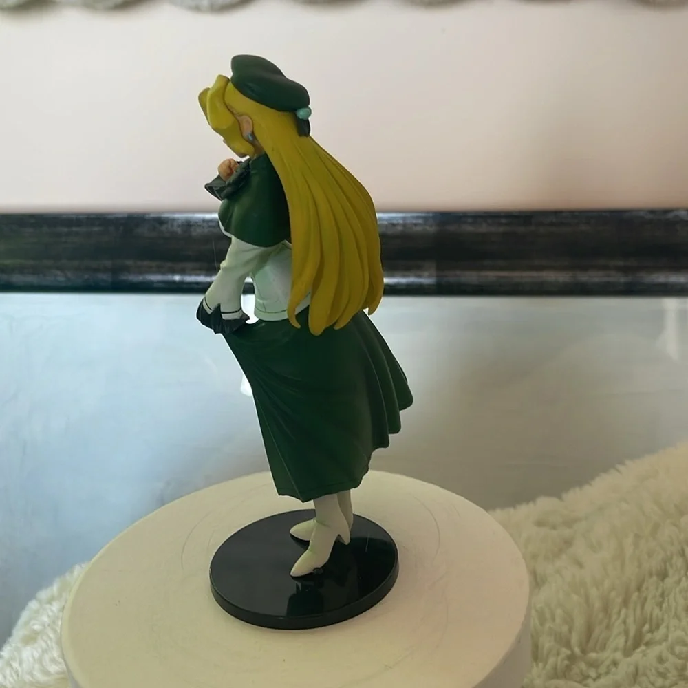 Green and White Anime Figurine