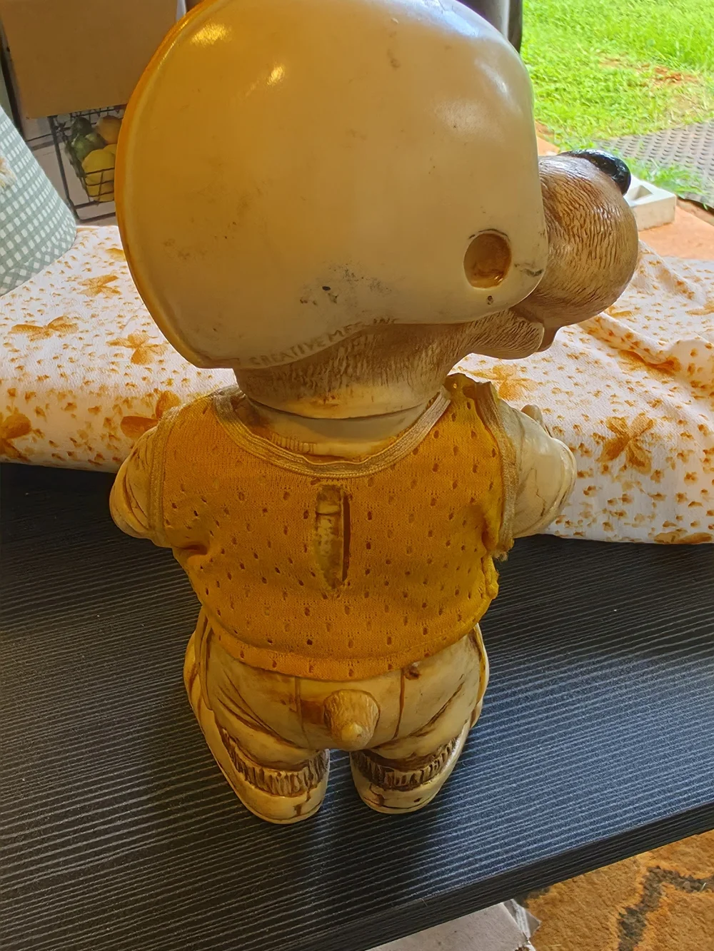 Vintage Dog Figurine Wearing Helmet - Yellow Accent