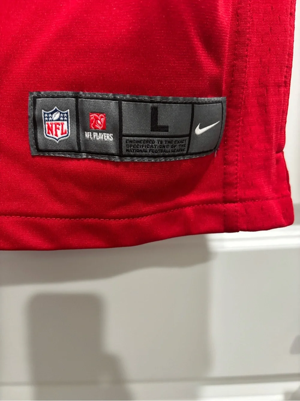 NFL Red On-Field Nike Football Jersey Collar Label