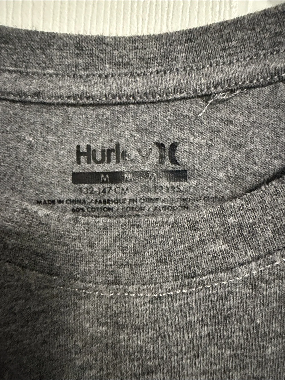 Hurley Dark Gray Long Sleeve Tee with Teal and Purple Graphic