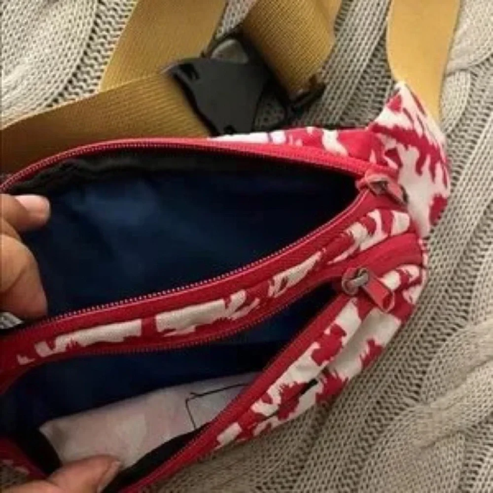 Kavu Red and White Patterned Waist Bag with Tan Strap