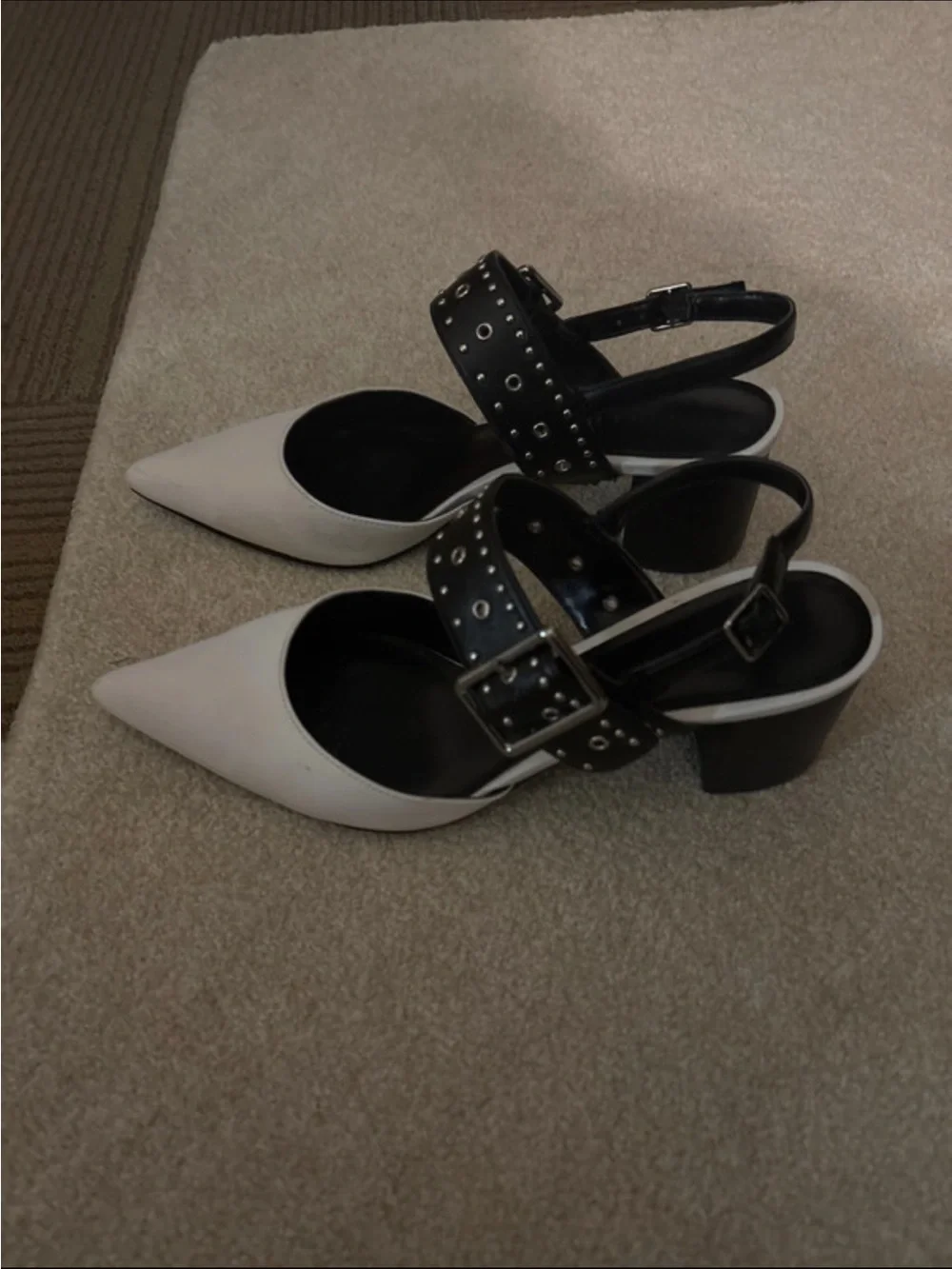 Charles & Keith White Pointed Slingback Heels with Black Studded Straps