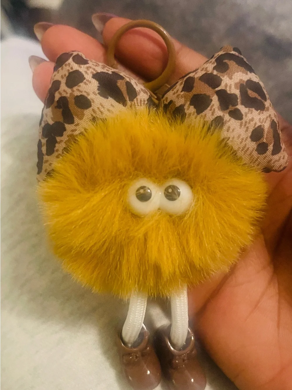 Fuzzy Pom Pom Keychain with Leopard Bow and Cute Eyes