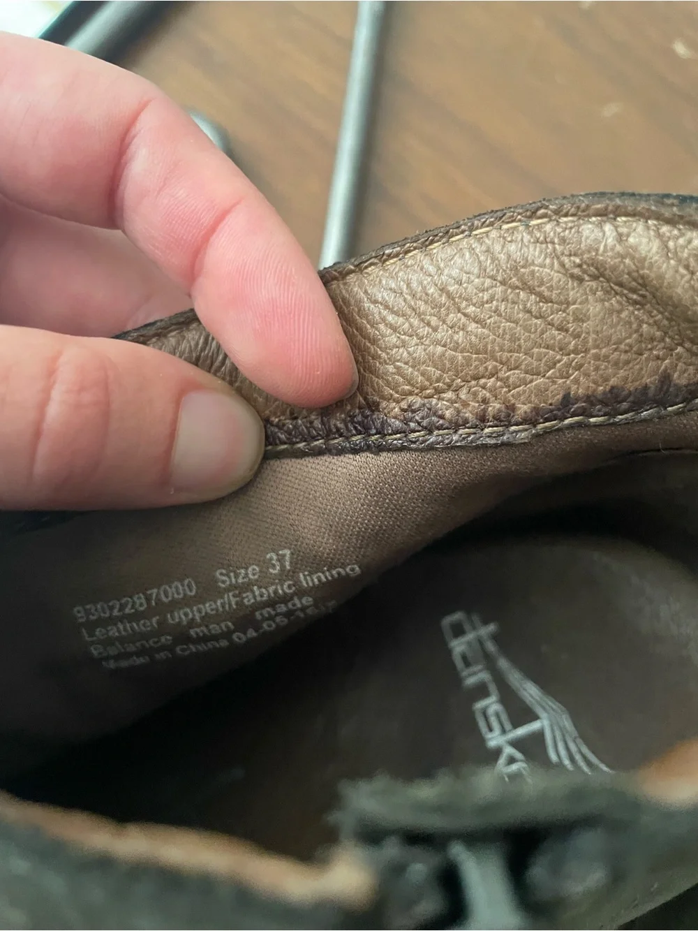 Dansko booties wear left