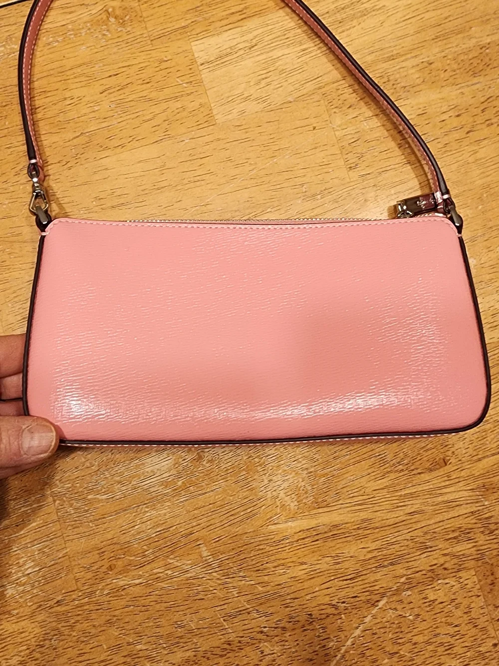 Kate Spade New York Gemini Convertible Wristlet in a pink color