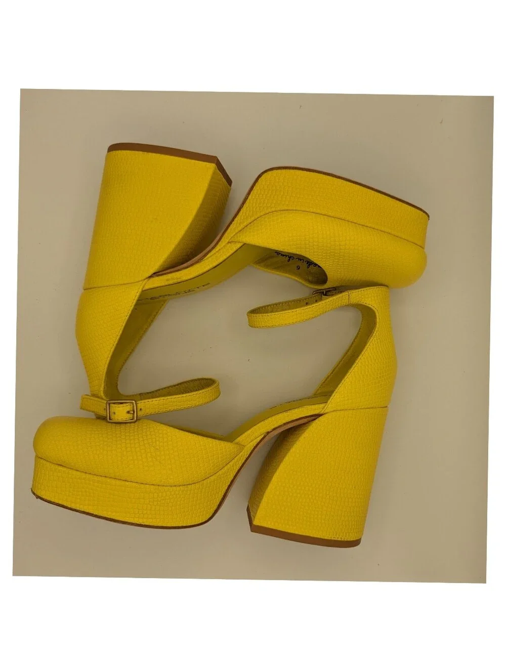 Charlotte Stone yellow platform