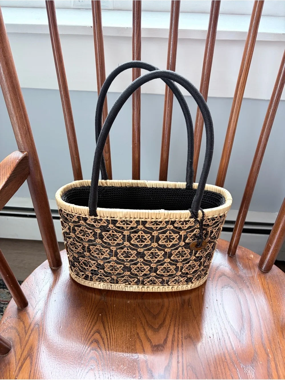 The Sak Woven Rattan Basket Drawstring Tote Purse