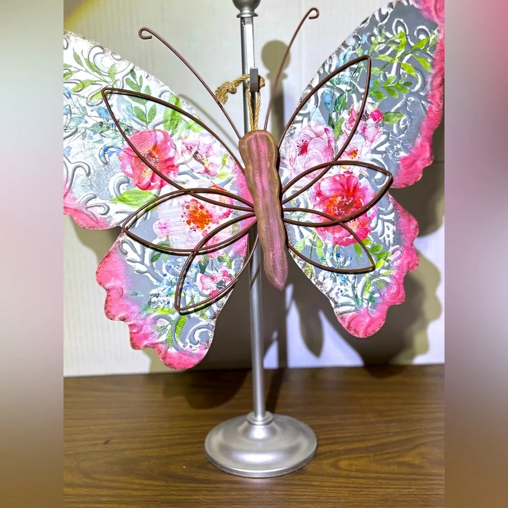 Metal butterfly w/wood accents Hanger on back Perfect for a patio or inside 18.5