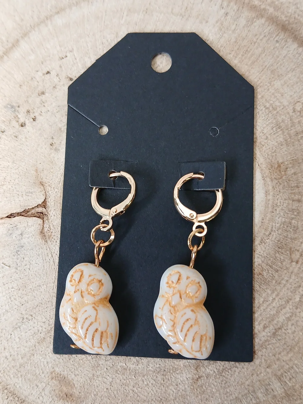 Gold Hoop Earrings with Cream Carved Bead Charms
