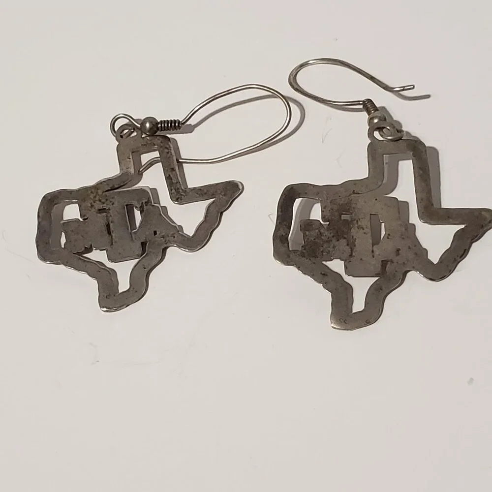 Source Unknown dangle aggies 131