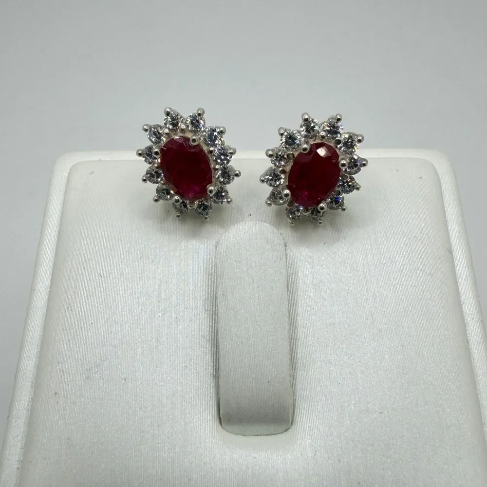 NWOT 5x7mm oval cut RUBIES w/ halo of cz‎ diamond stud earrings in 925!