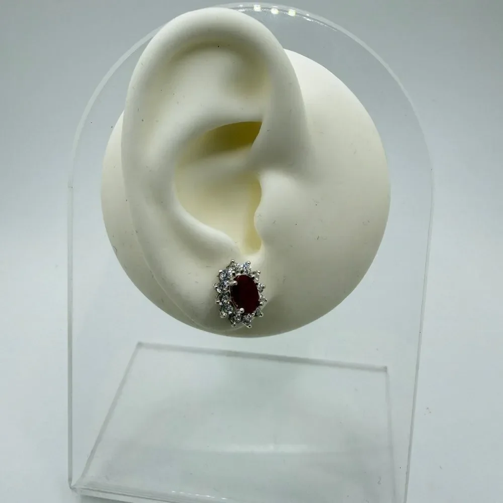 NWOT 5x7mm oval cut RUBIES w/ halo of cz‎ diamond stud earrings in 925!
