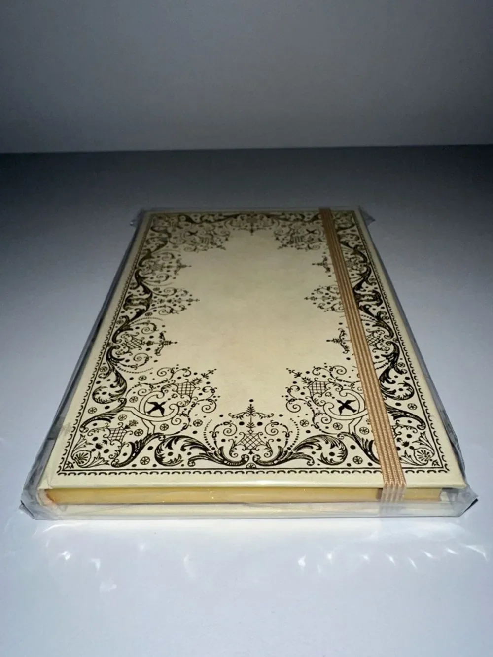 Gilded Ivory gold-foiled embossed cover gilded pages elastic closure journal
