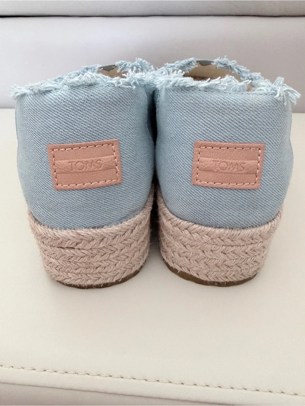 Toms like new