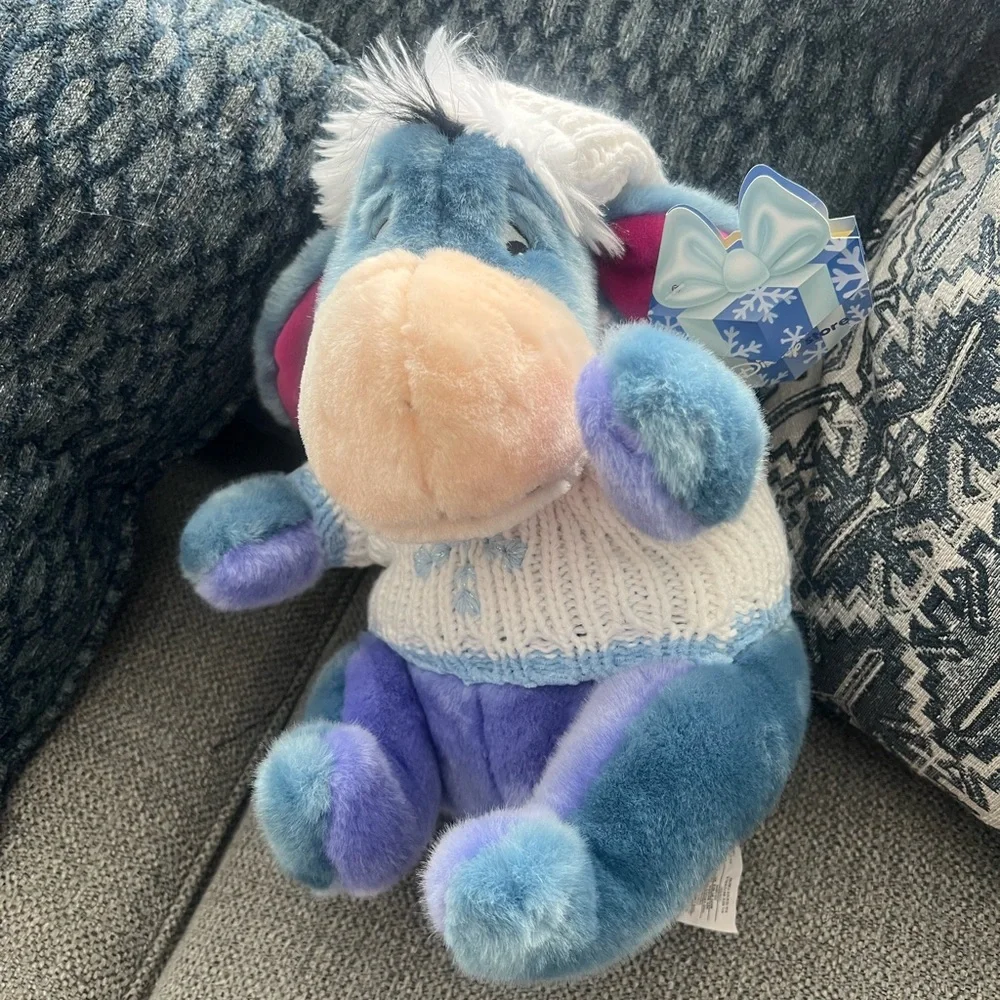 Disney collectible Eeyore plush.‎