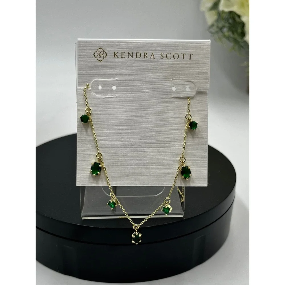 Kendra Scott brass shaped