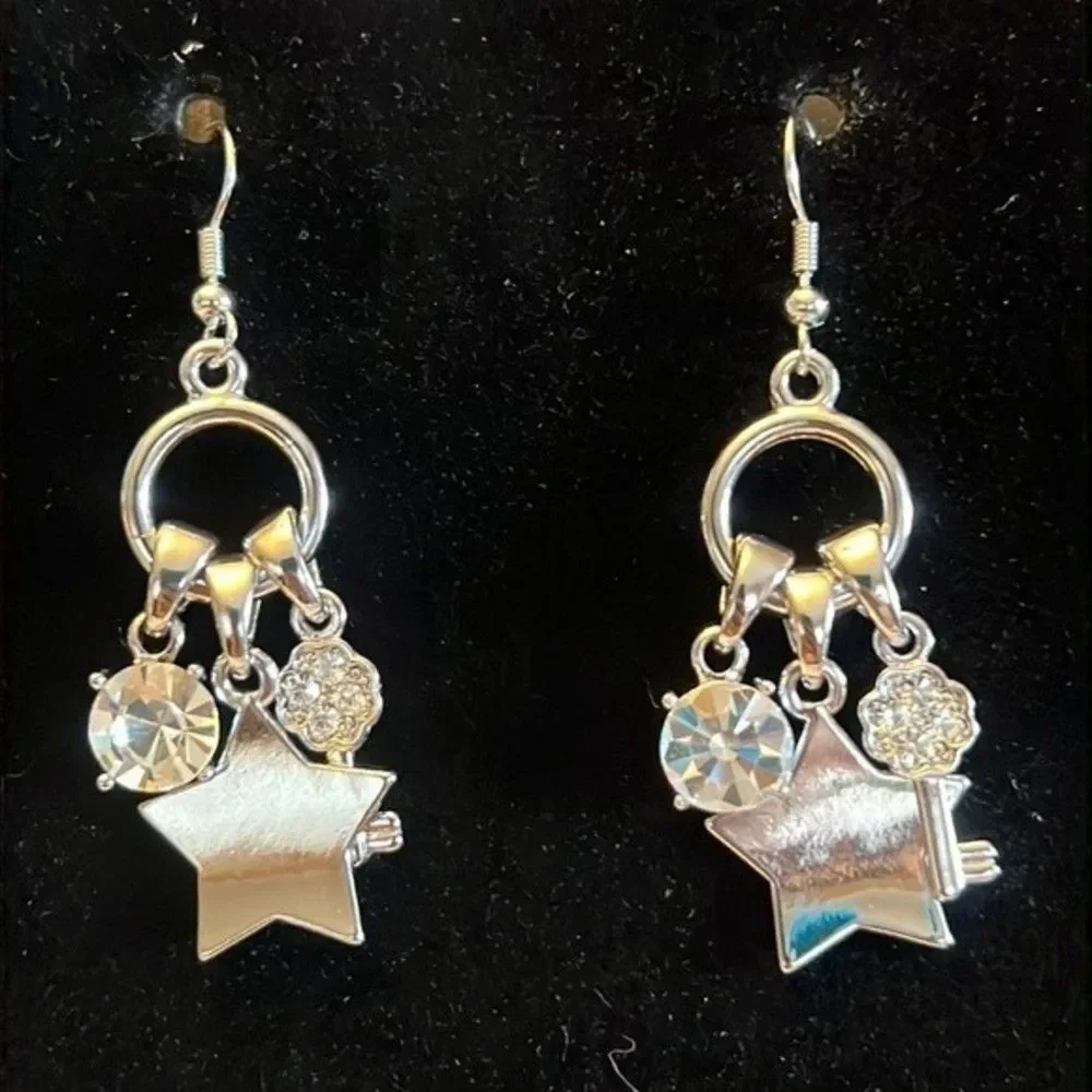 Fun silver tone dangle earrings.